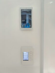 Savant Smart Home White Touchpanel on wall