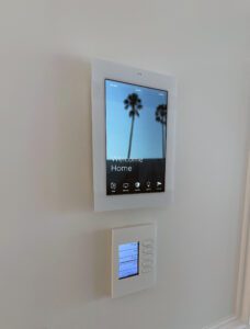Savant Smart Home White Touchpanel on wall
